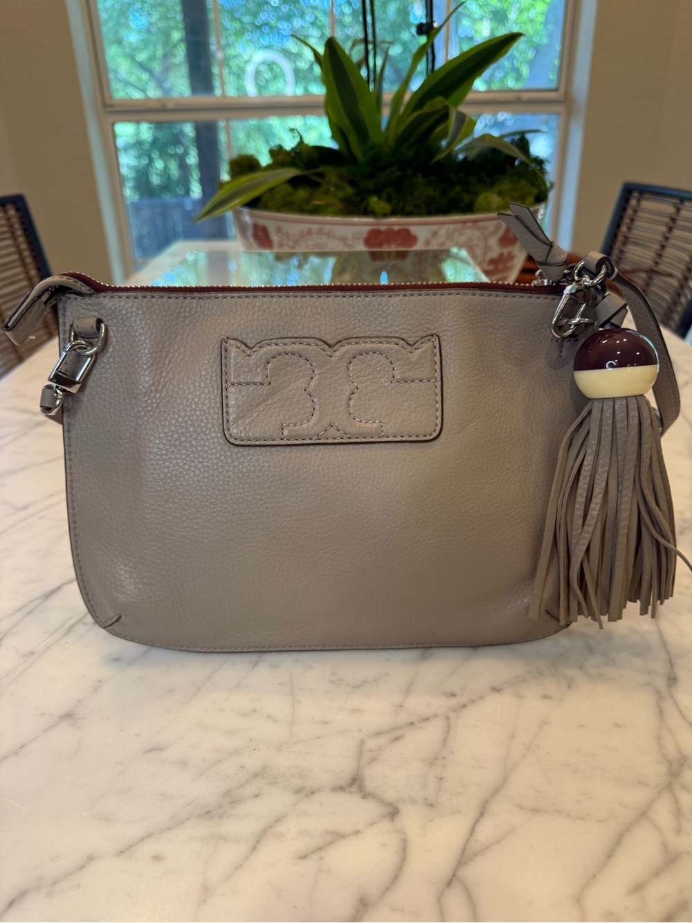 Leather Crossbody Bag in Taupe with Tassel Charm